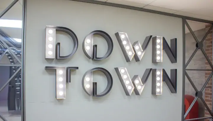 Ameriabank channel letters spelling out Down Town, made of aluminum and acrylic