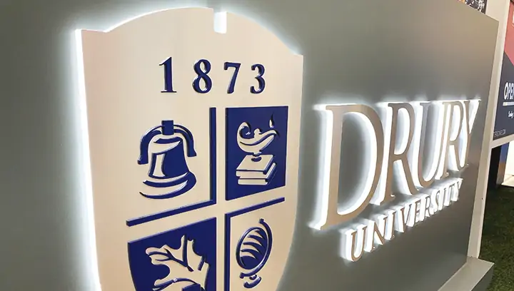 Drury University halo-lit channel letters and logo made of brushed aluminum and acrylic