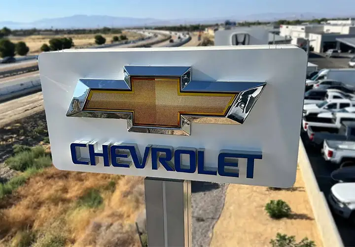 Auto mall pylon sign for the City of Lancaster featuring the logo and name of Chevrolet