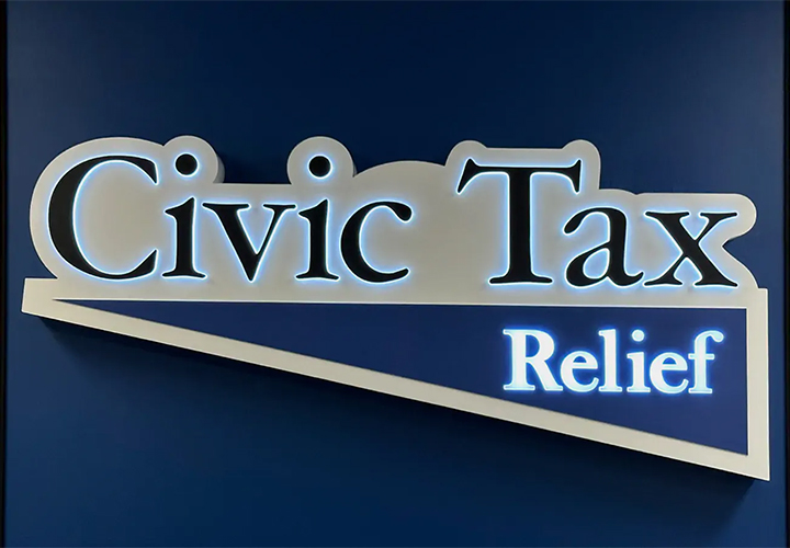 Civic Tax Relief light box sign made of aluminum and vinyl, mounted on the interior wall