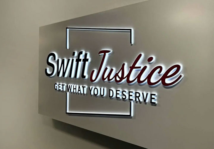 Swift Justice, Inc. light up sign made of aluminum and acrylic for interior branding