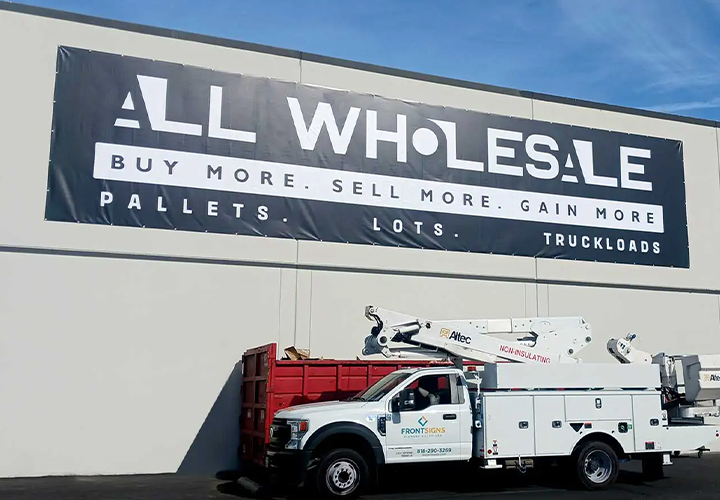 All Wholesale LLC large format printing displaying the brand name and slogan for exterior branding