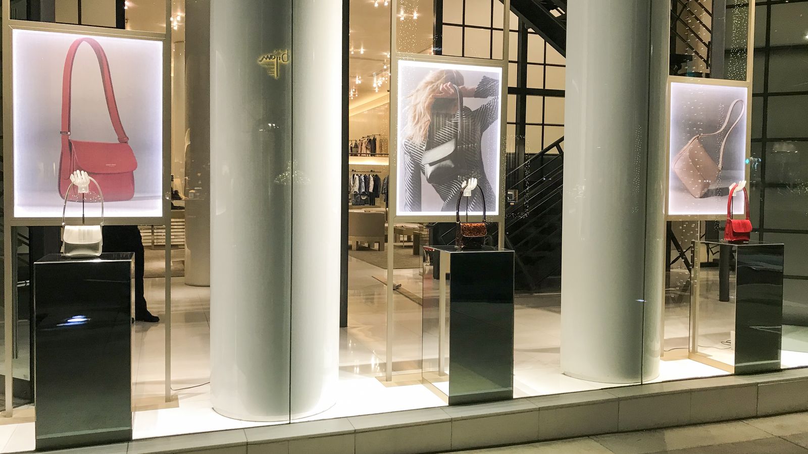 Giorgio Armani | storefront branding with acrylic displays | Front Signs