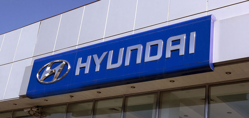 Showcasing how an aluminum business sign is made for Hyundai's car salon
