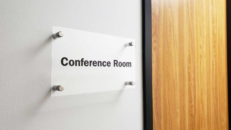 Conference room acrylic nameplate with standoffs | Front Signs