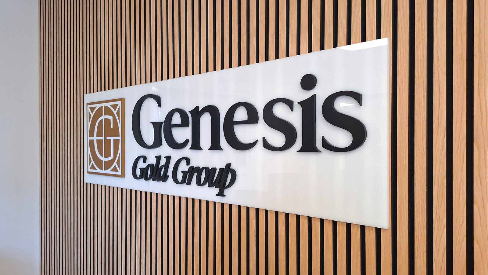 genesis gold group acrylic sign installed indoors