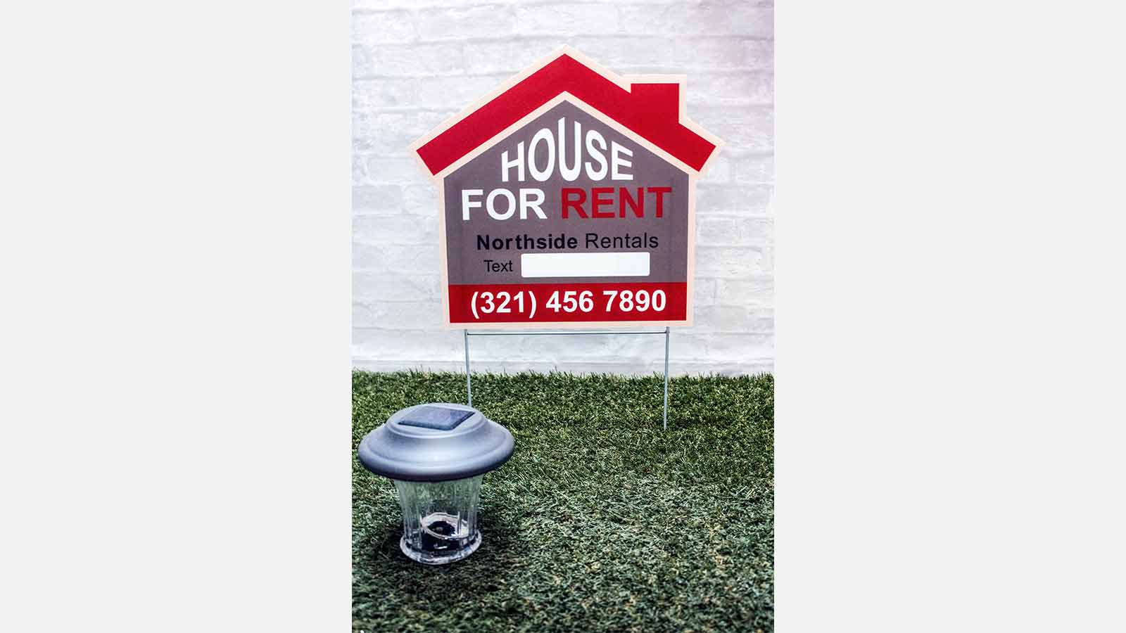 house for rent real estate sign