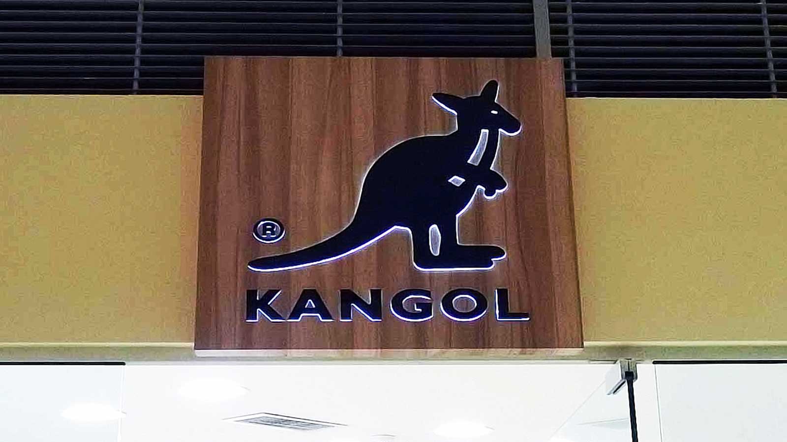 kangol illuminated wooden sign
