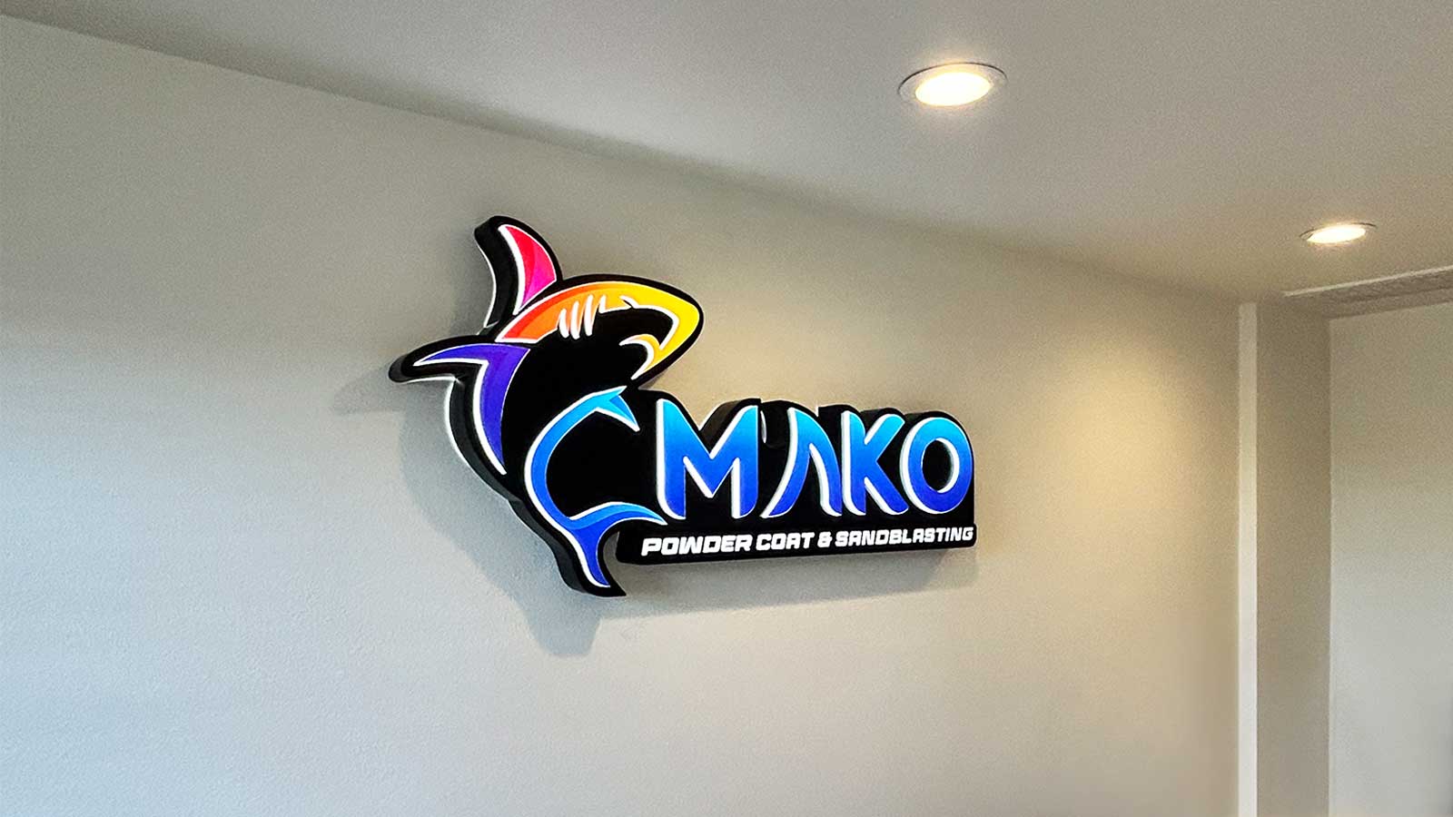 mako powder coat and sandblasting logo sign on the wall