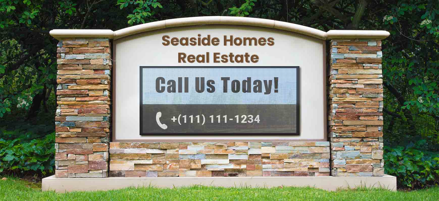 Realtor outdoor monument LED display with a screen on a beige base reading a phone number