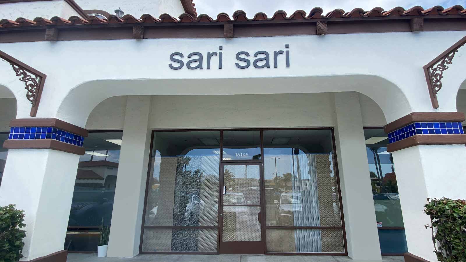 sari sari store sign installed on the outdoor wall
