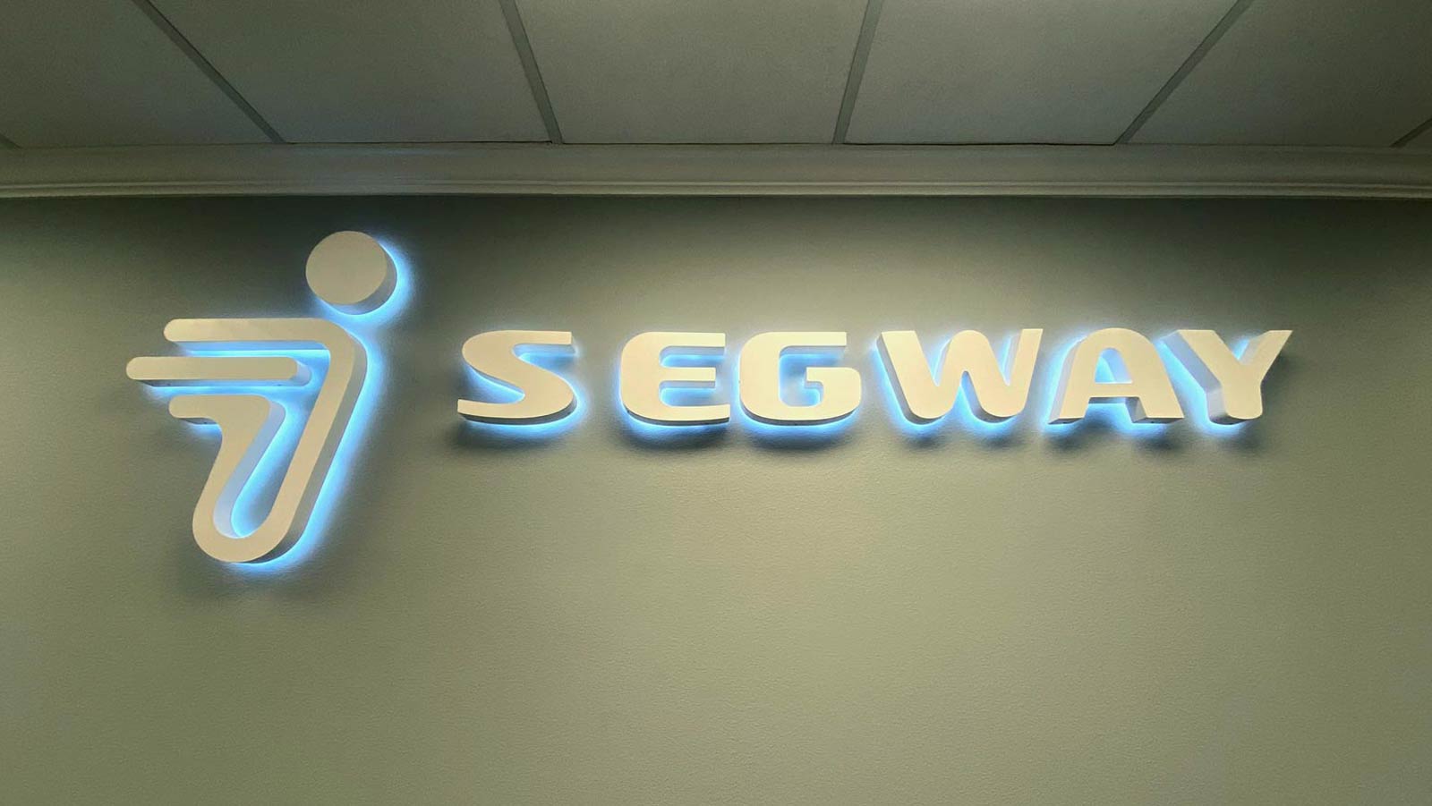 segway store sign attached to the indoor wall