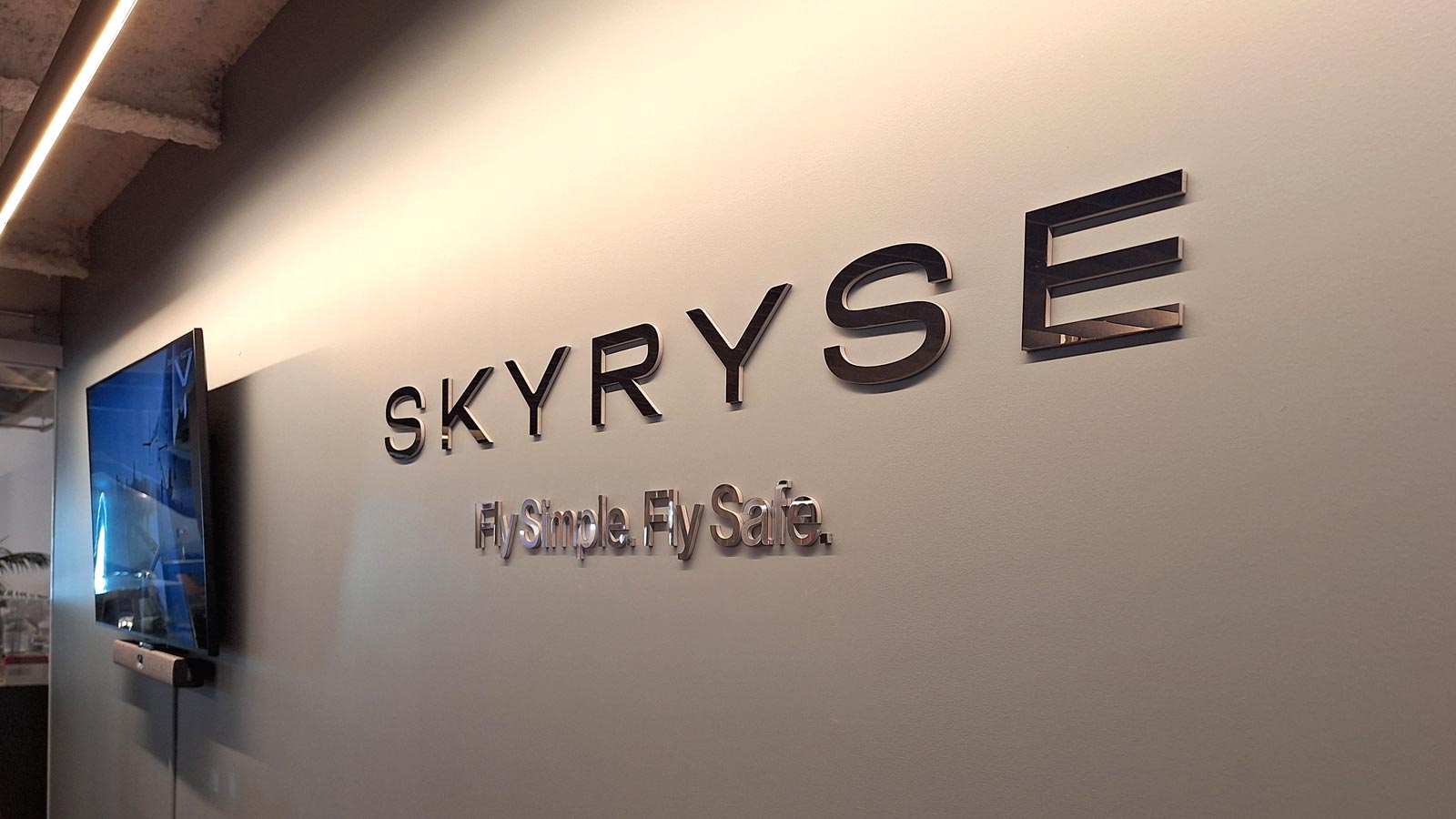 skyryse interior sign attached to the wall