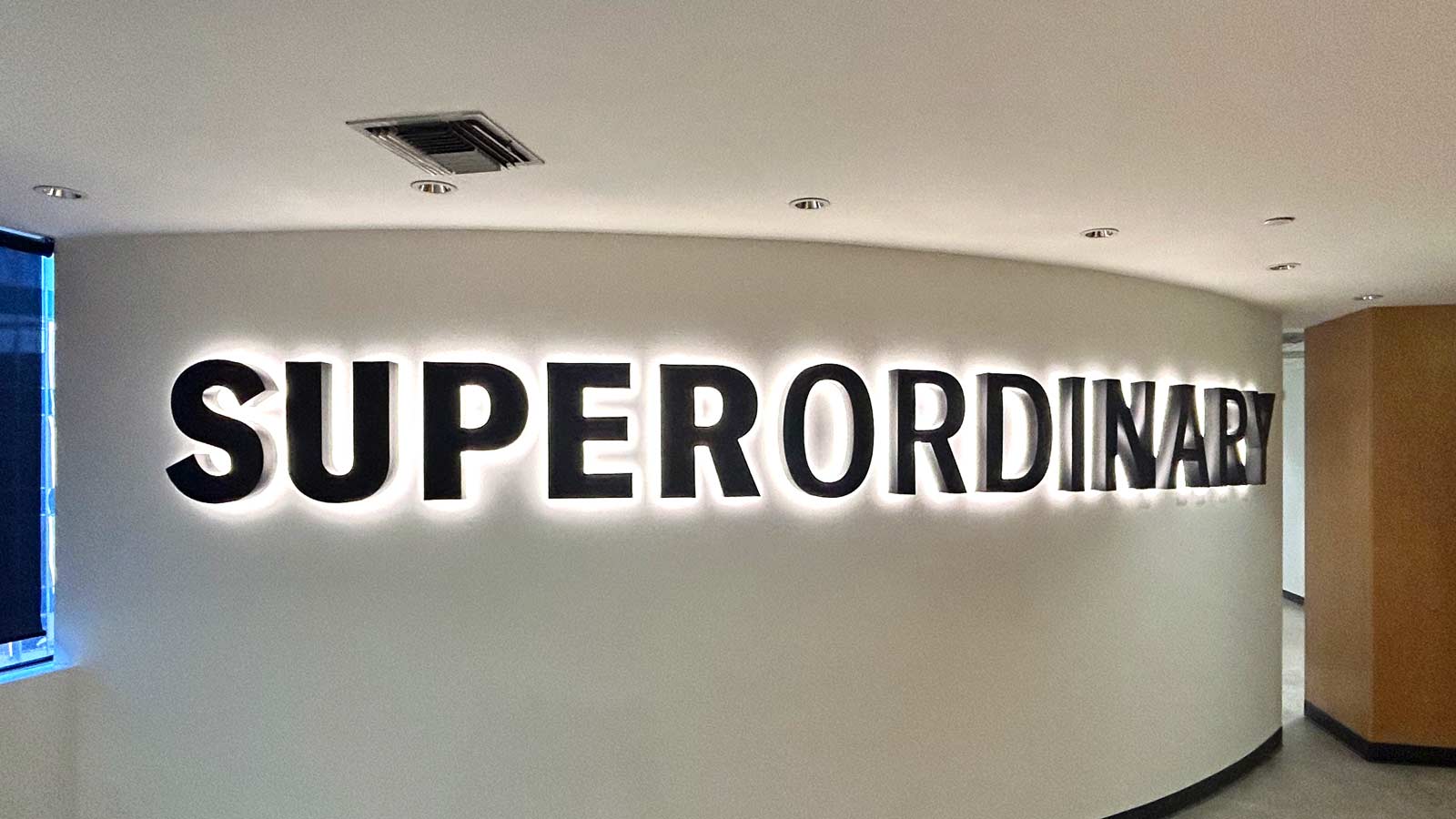 superordinary reverse channel letters installed on the wall