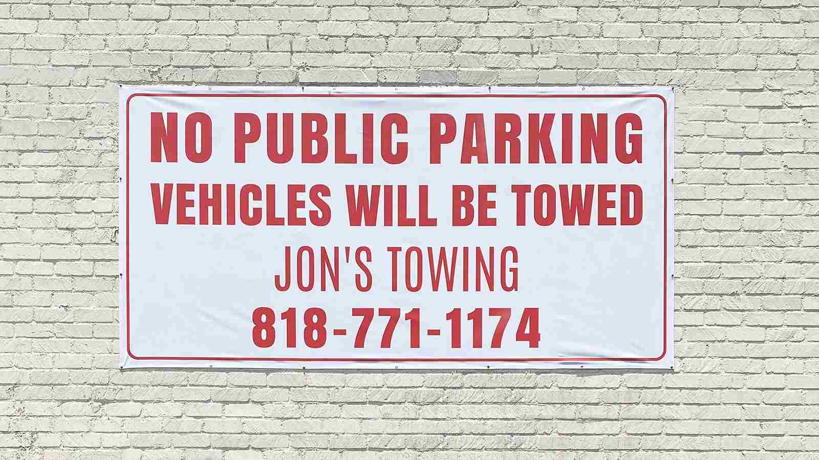 jons towing no parking vinyl banner