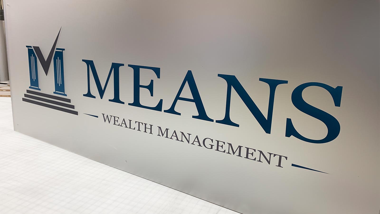 Acrylic nameplate for a wealth management