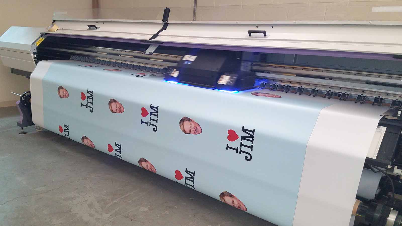 Wide format printing of a personalized vinyl banner