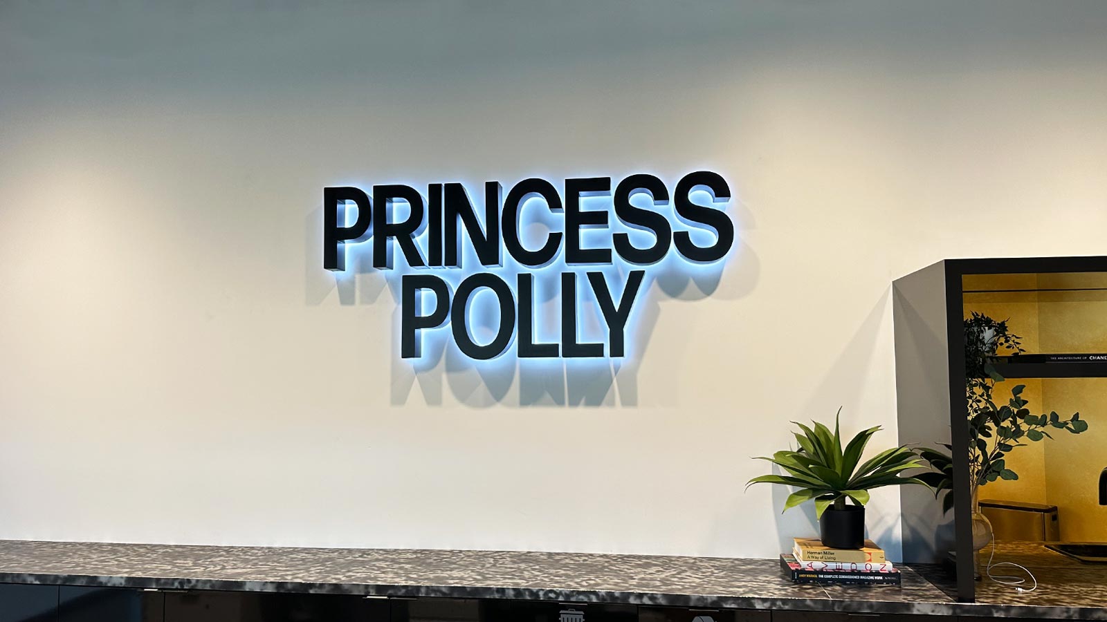 princess polly backlit letters installed indoors