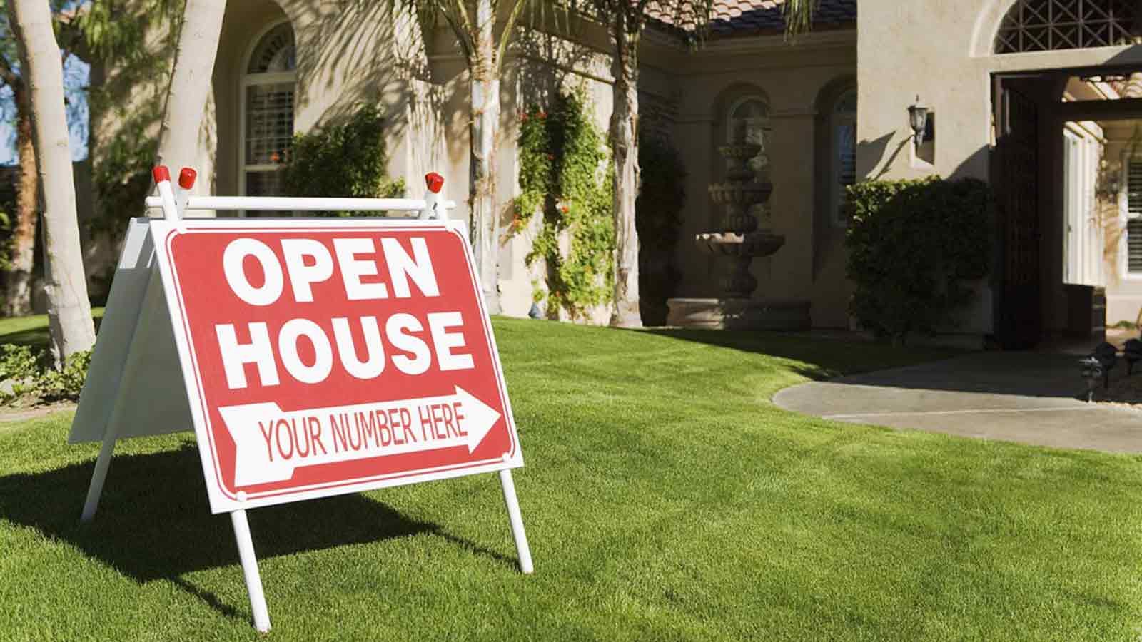 red and white open house sign