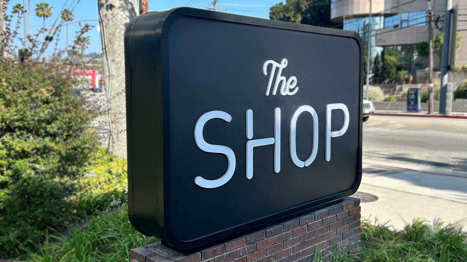 the shop outdoor sign face vinyl replacement