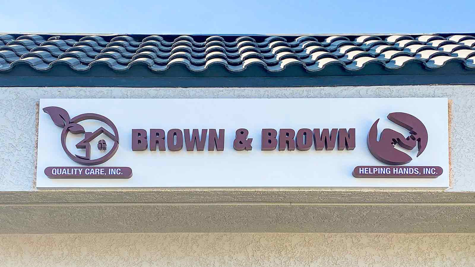 brown and brown storefront 3d letters