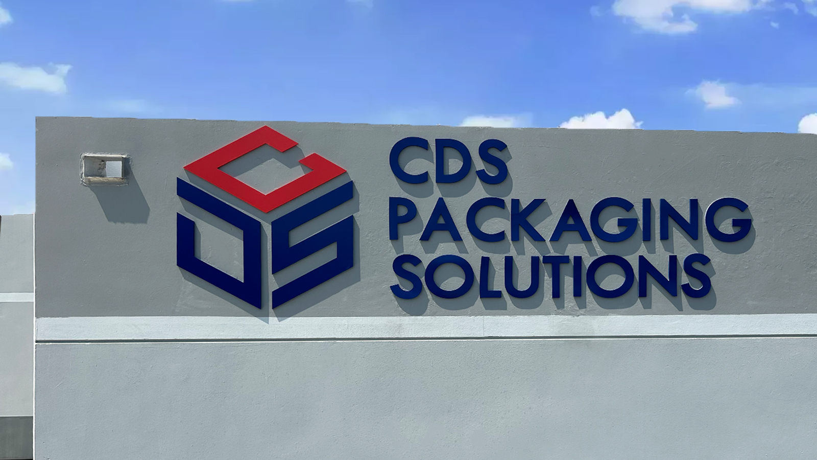 cds packaging solutions pvc high-rise sign on the facade