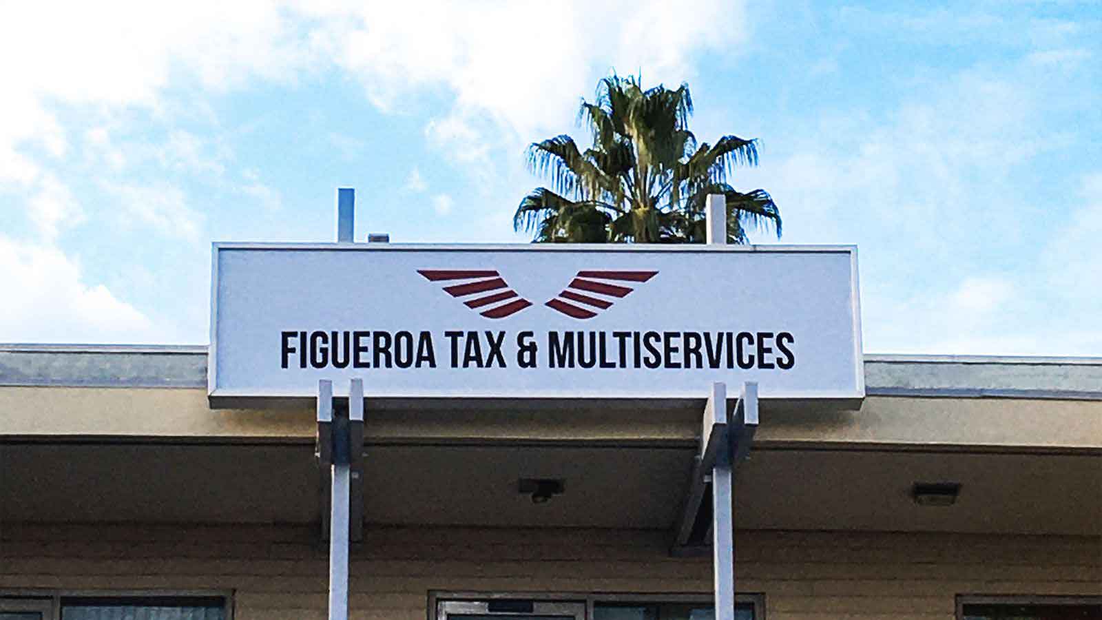 figueroa tax and multiservices lightbox sign