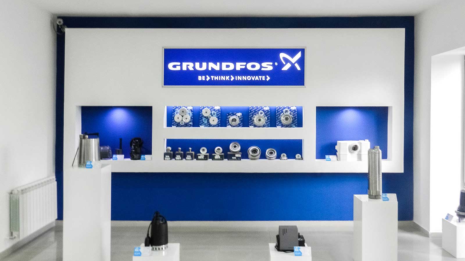 grundfos store interior illuminated signs