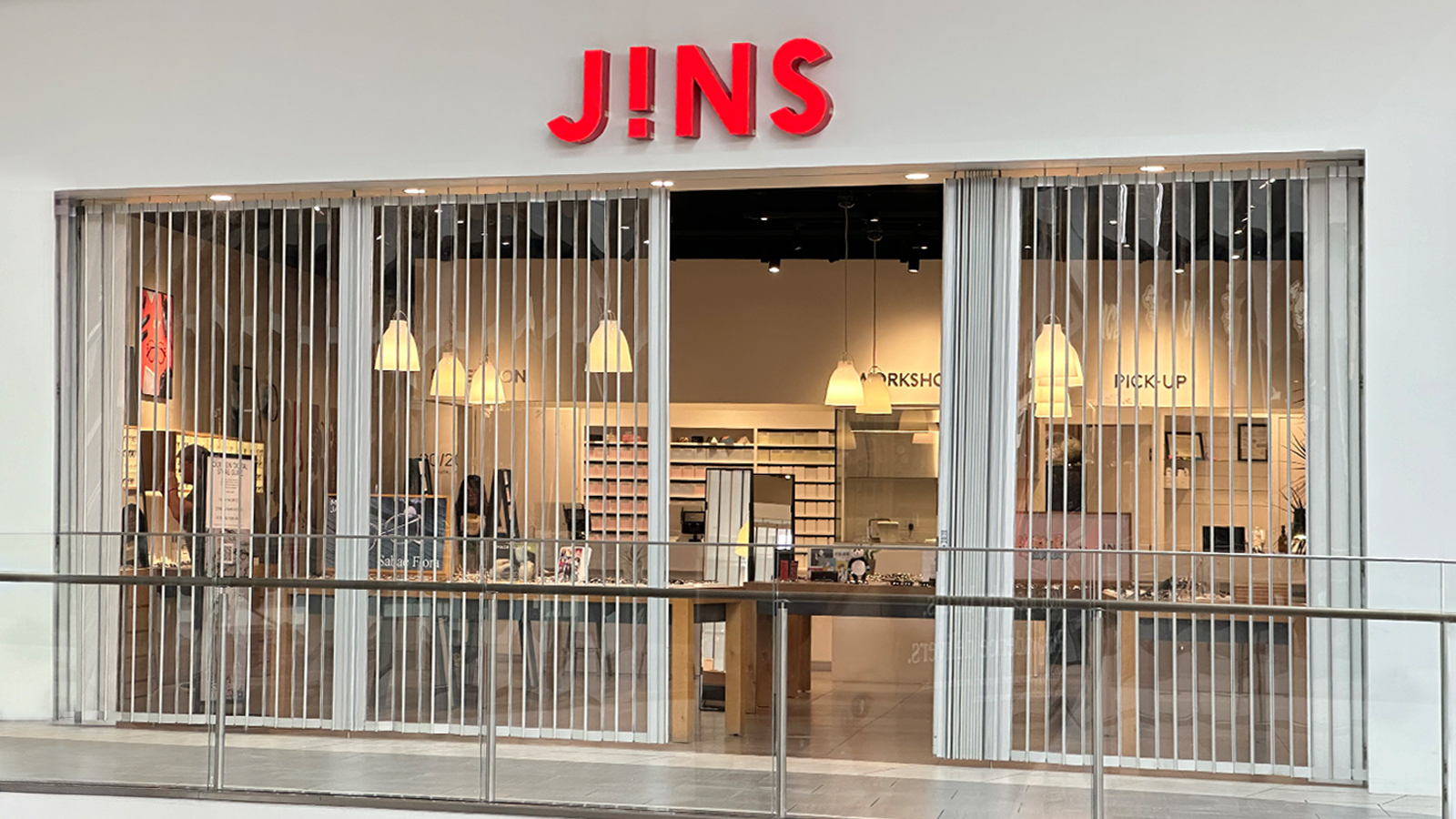 jins store sign attached to the storefront