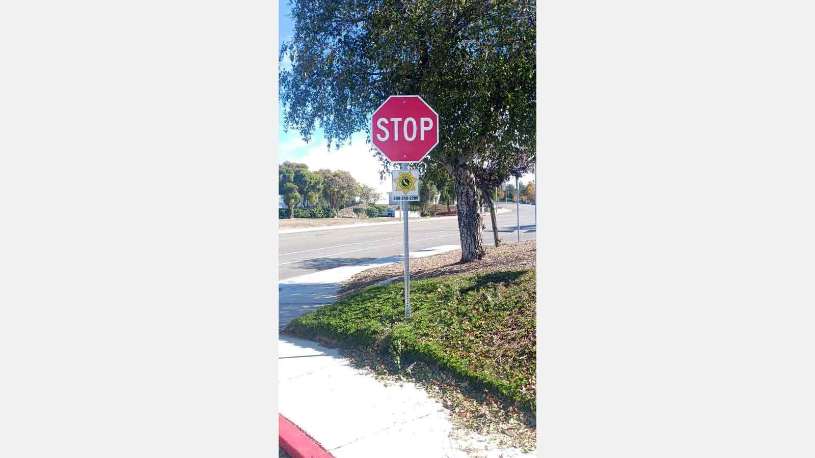 red and white regulatory stop sign