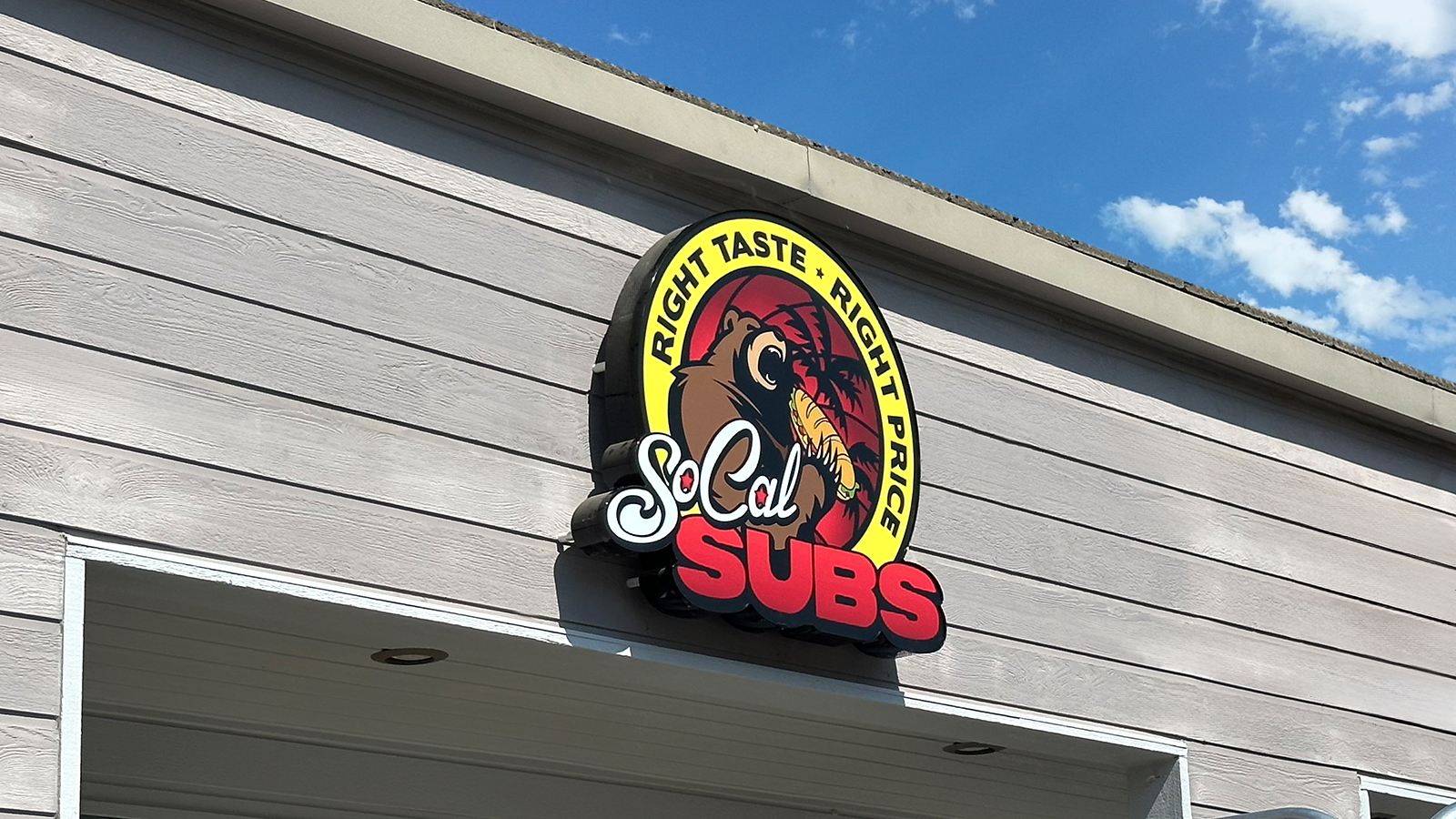 socal subs restaurant sign face replacement for the facade