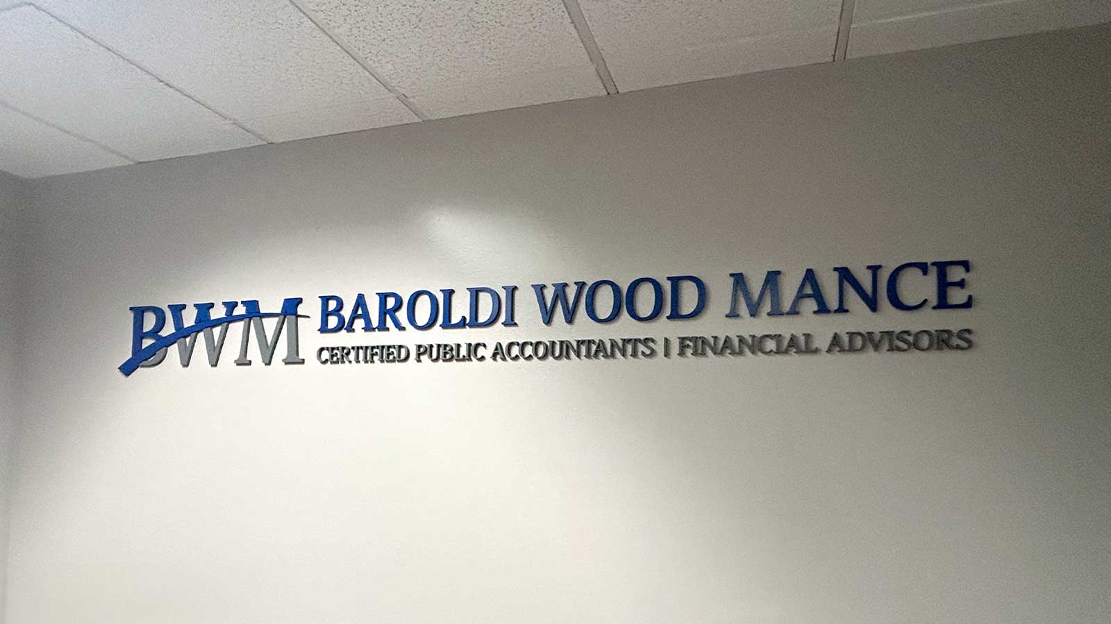 baroldi gundersen wall signage attached to the interior wall