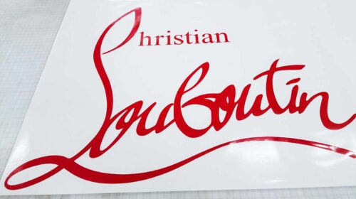 christian louboutin vinyl lettering in red