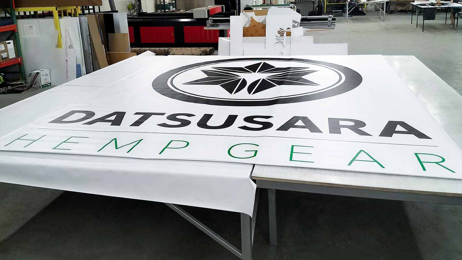 datsusara vinyl banner with brand logo