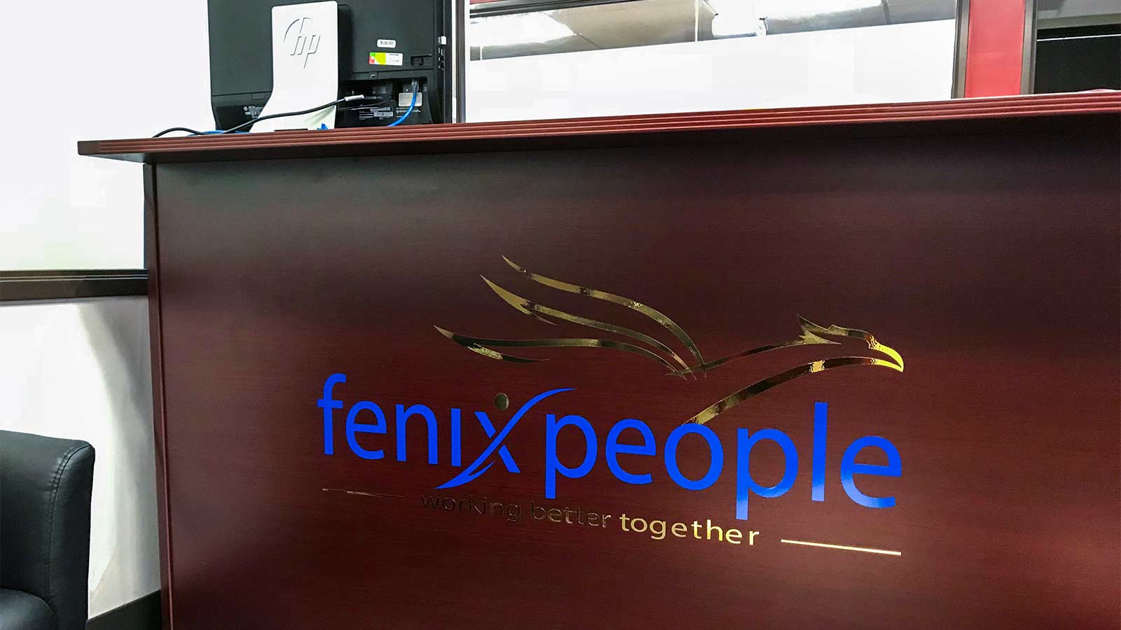 fenix people front desk vinyl lettering