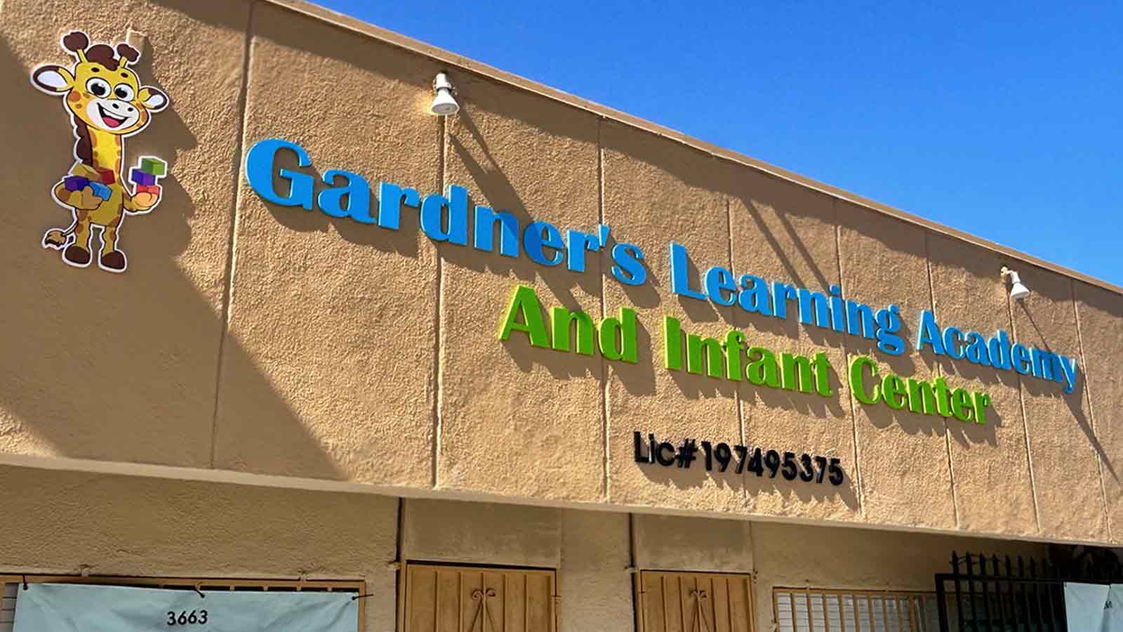 gardner's learning academy pvc sign on the storefront