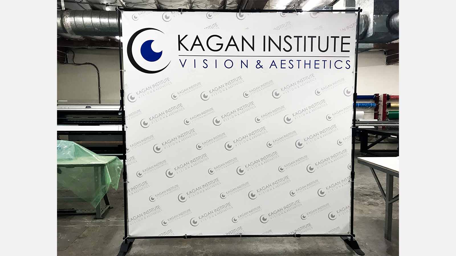 kagan institute telescopic vinyl banner