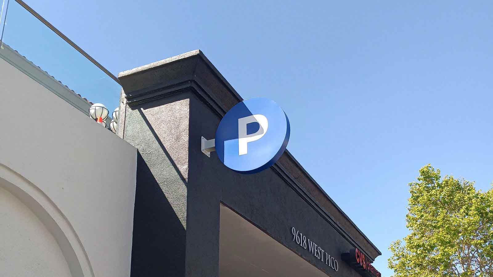 p letter wall blade parking sign