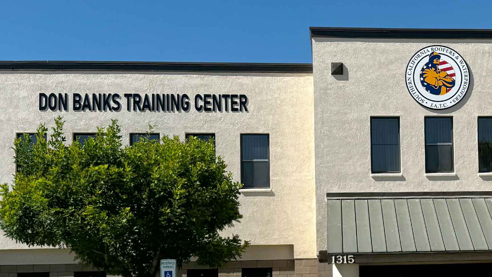 socal roofers and waterproofers building signs for outdoors