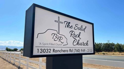 solid rock church vinyl prints installation on lexan panels