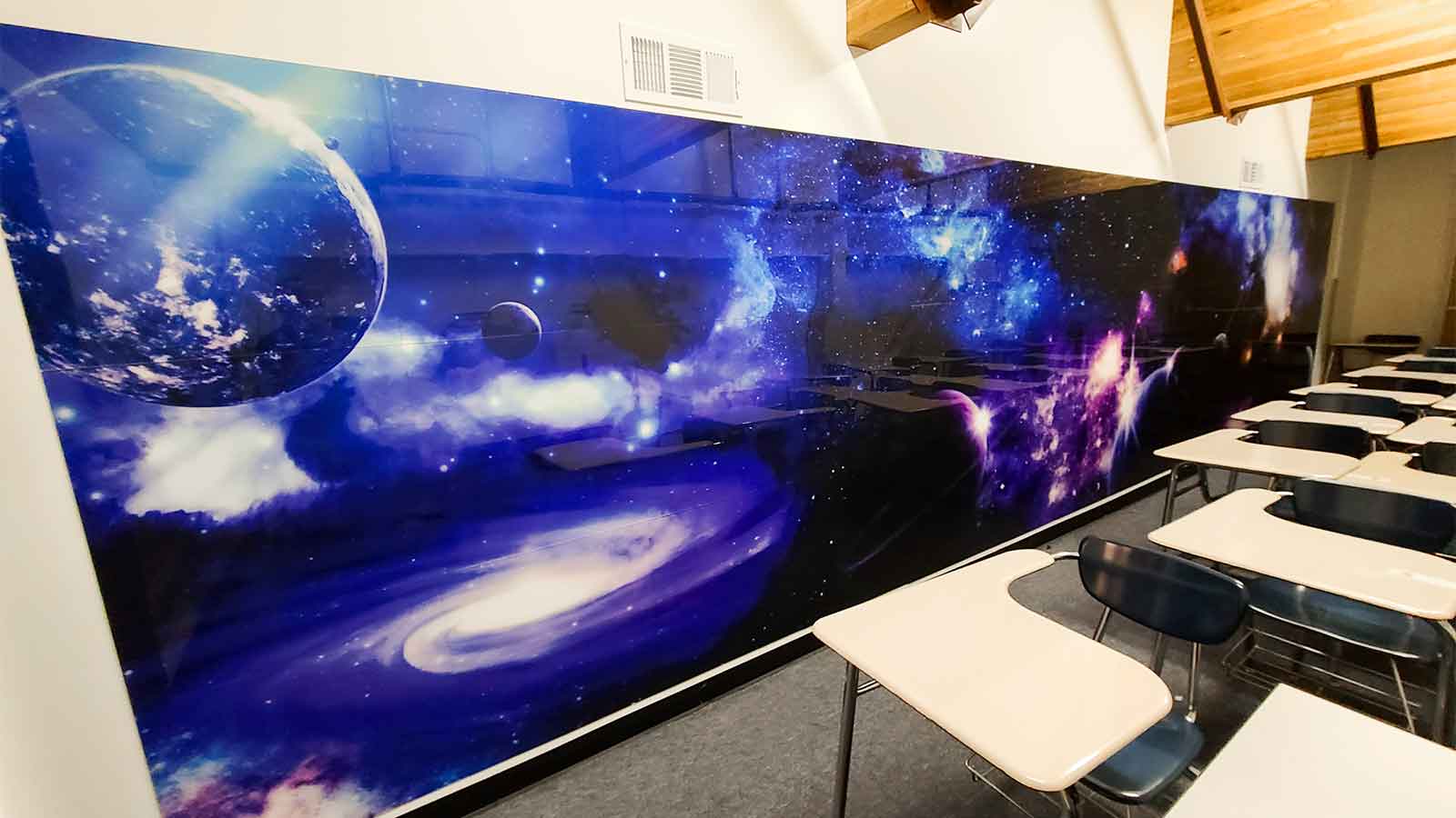 space-themed decorative acrylic wall sign