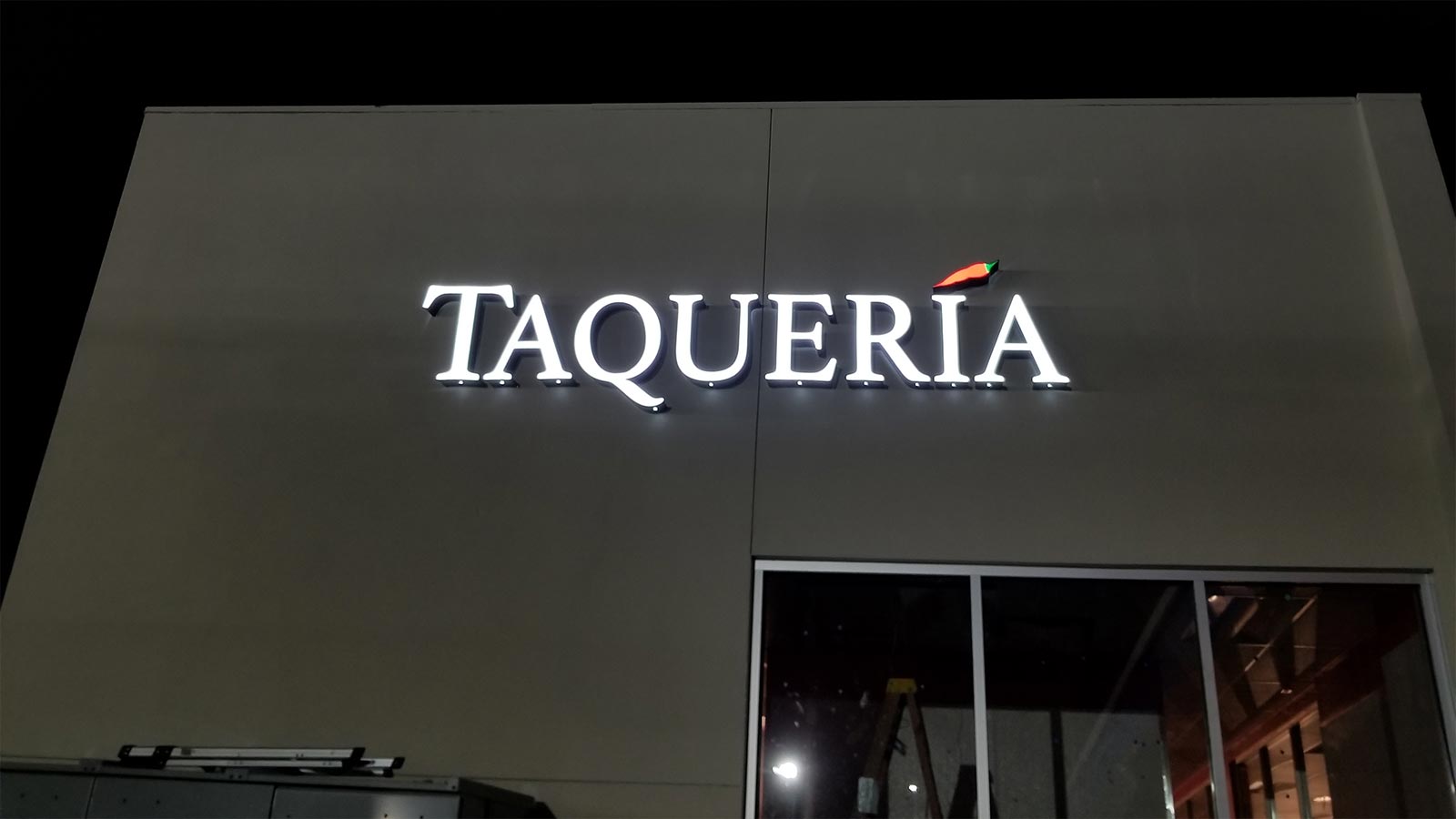 taqueria white illuminated channel letters