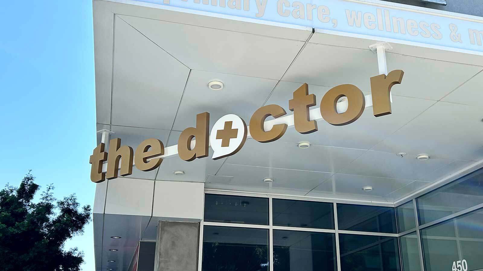 the doctor foam core sign installed at the entrance