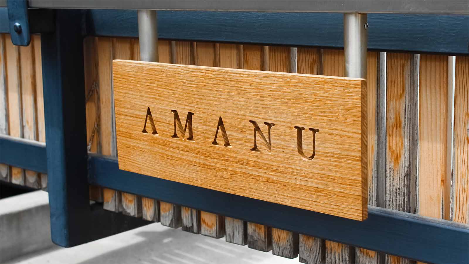 amanu elegant wooden sign