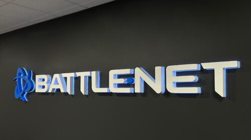 battlenet halo-lit display installed on the black wall