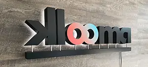 Klooma backlit logo by Front Signs sign making company in Los Angeles, operating US-wide"