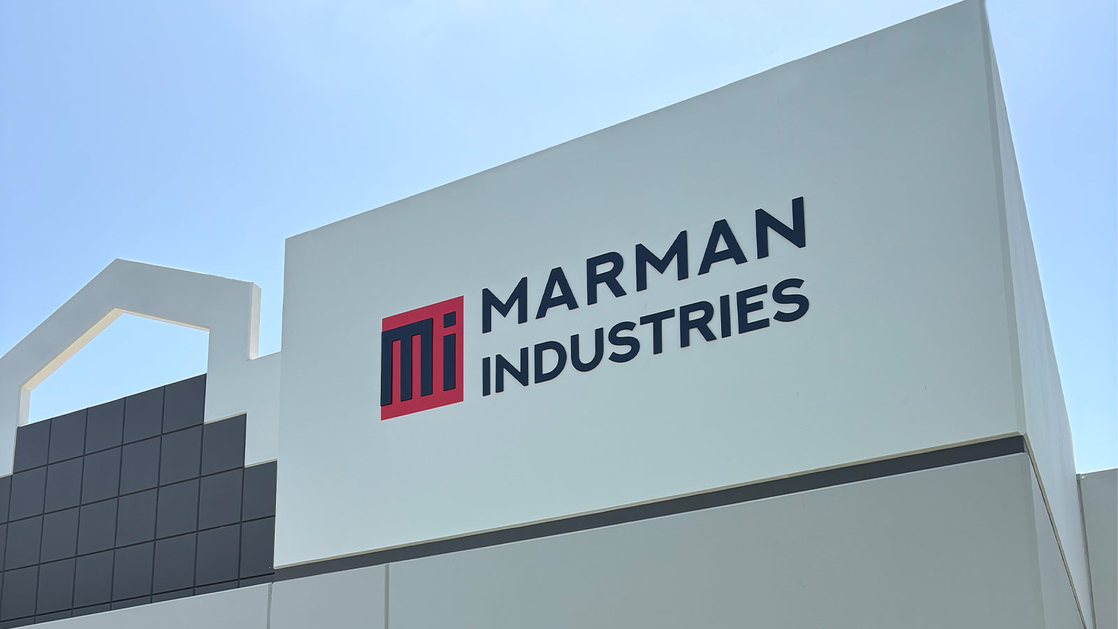 marman industries inc non-lit letters and logo on the wall