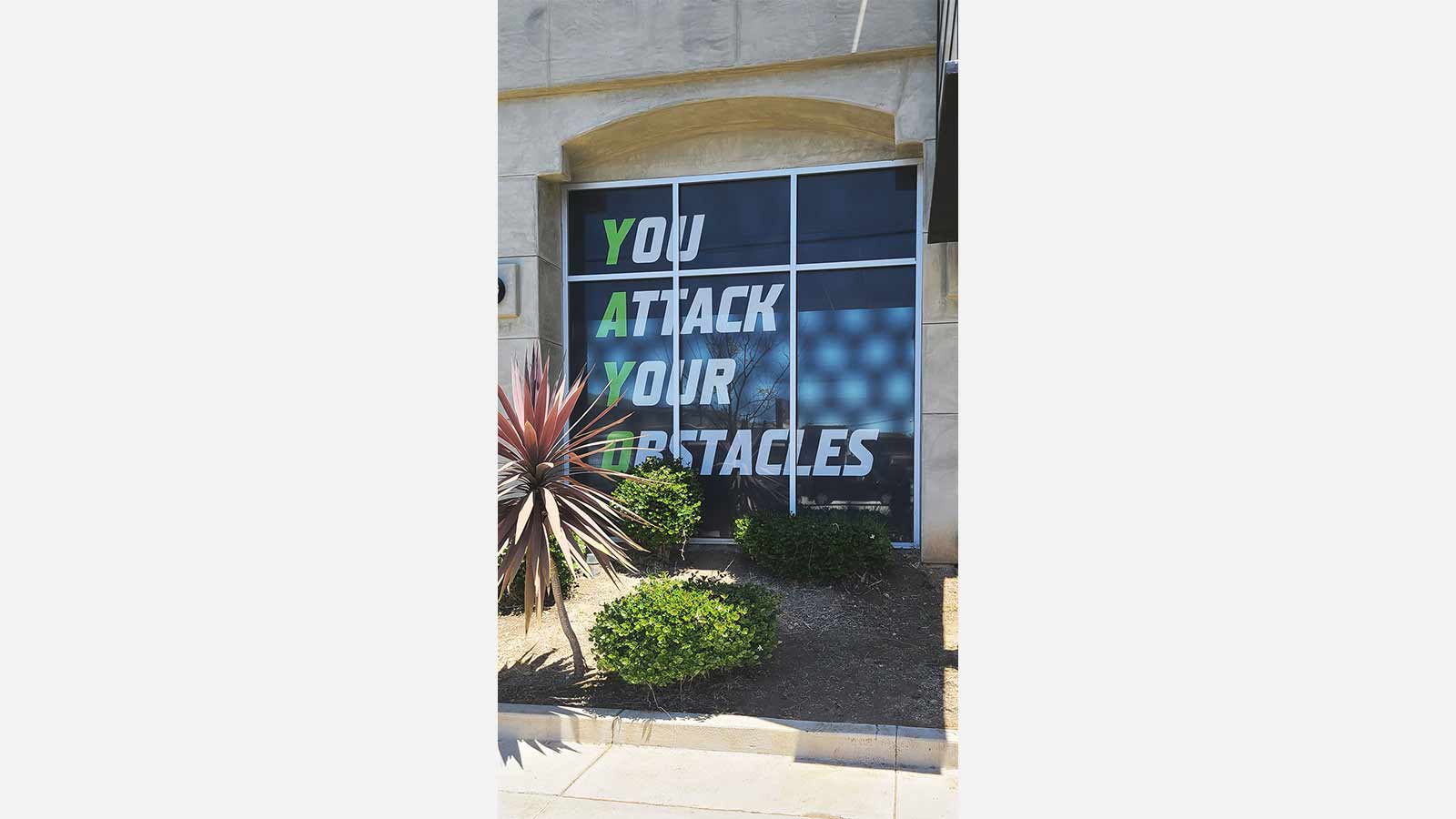 yayo fitness perforated storefront decals