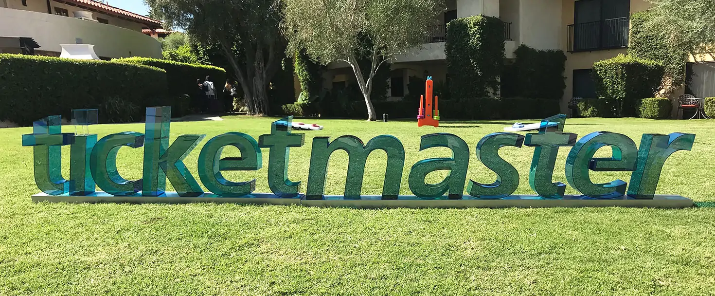 Freestanding outdoor signage for Ticketmaster made of acrylic in translucent green