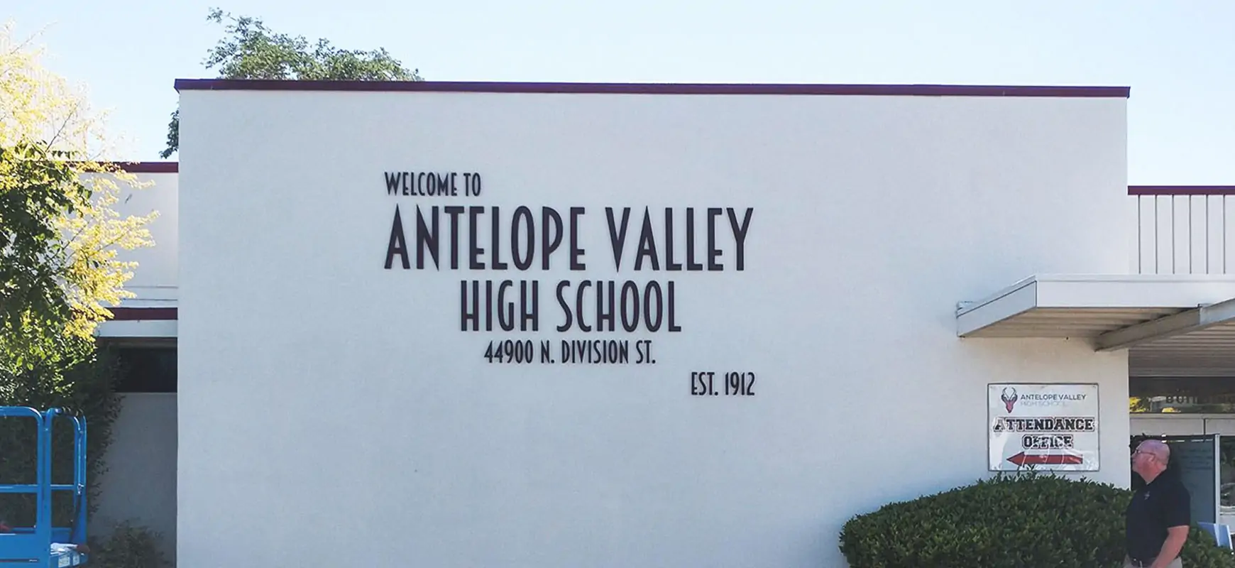 Building outdoor signs reading school name and address for Antelope Valley High School